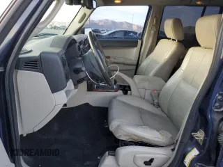 2006 Jeep Commander Limited with VIN 1J8HH58N36C144683, listed as a Copart auction lot 74019594 with 144,543 mi miles and Salvage Title. Bid and sale history available at carsss.com. Image 7.