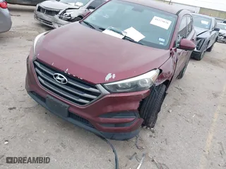 2016 Hyundai Tucson SE with VIN KM8J23A4XGU041915, listed as a IAAI auction lot 41573038 with 101,937 mi miles. Bid and sale history available at carsss.com. Image 2.