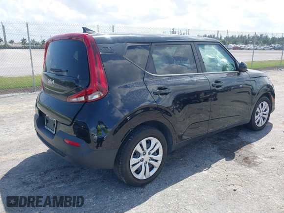 2022 Kia Soul LX with VIN KNDJ23AU1N7814772, listed as a IAAI auction lot 41968141 with 56,651 mi miles. Bid and sale history available at carsss.com. Image 4.