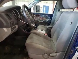 2015 Toyota Tacoma with VIN 3TMLU4EN6FM186016, listed as a Copart auction lot 58404675 with 127,536 mi miles and Salvage title. Bid and sale history available at DreamBid. Image 7.
