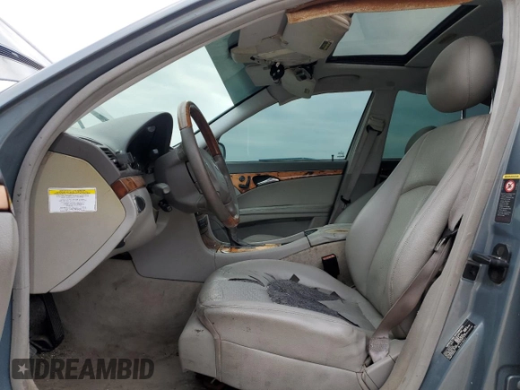 2005 Mercedes-Benz E-Class 3.2L with VIN WDBUF65J25A655040, listed as a Copart auction lot 87414674 with 147,847 mi miles and Salvage Title. Bid and sale history available at carsss.com. Image 7.
