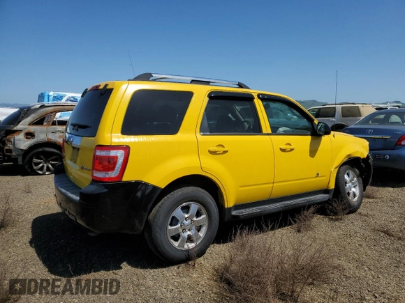 2010 Ford Escape Hybrid with VIN 1FMCU4K38AKB66672, listed as a Copart auction lot 51331815 with 371,313 mi miles and Salvage title. Bid and sale history available at DreamBid. Image 3.