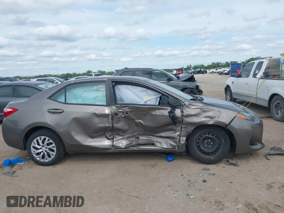 2018 Toyota Corolla L with VIN 2T1BURHE1JC983389, listed as a IAAI auction lot 42221142 with 79,113 mi miles and . Bid and sale history available at DreamBid. Image 13.