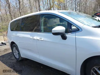 2023 Chrysler Voyager LX with VIN 2C4RC1CG4PR534115, listed as a IAAI auction lot 41979160 with 54,199 mi miles. Bid and sale history available at carsss.com. Image 12.