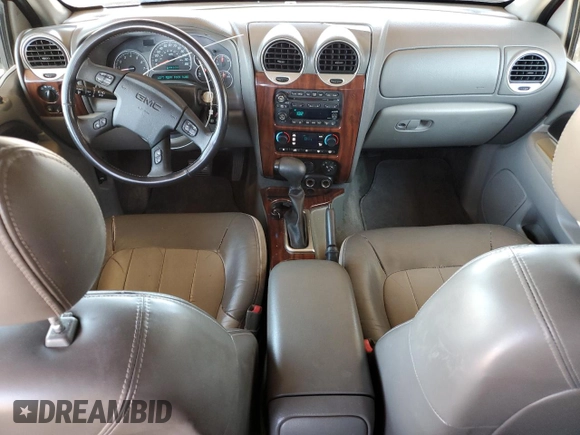 2004 GMC Envoy SLT with VIN 1GKET16S646144154, listed as a Copart auction lot 54154855 with 168,190 mi miles and Clean Title. Bid and sale history available at DreamBid. Image 8.