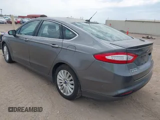 2014 Ford Fusion Titanium with VIN 3FA6P0SU0ER269411, listed as a IAAI auction lot 42163704 with 169,355 mi miles and . Bid and sale history available at DreamBid. Image 3.