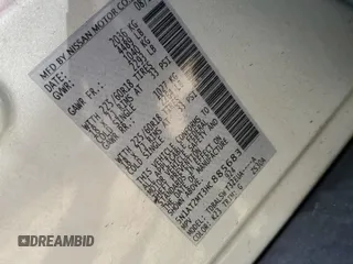 2017 Nissan Rogue SL z VIN 5N1AT2MT3HC885683, wystawiony jako Copart lot #54957275 z przebiegiem 127 879 mil mil oraz Szkoda całkowita • Salvage title. Historia ofert i sprzedaży dostępna na DreamBid. Obrazek 13.
