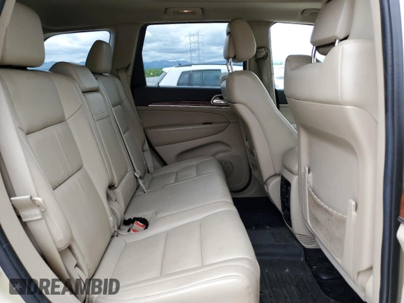 2011 Jeep Grand Cherokee Limited z VIN 1J4RR5GT1BC590599, wystawiony jako Copart lot #58657915 z przebiegiem 103 897 mil mil oraz Czysty tytuł • Clean title. Historia ofert i sprzedaży dostępna na DreamBid. Obrazek 11.