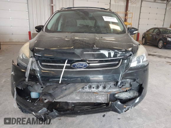 2014 Ford Escape Titanium с VIN 1FMCU0J9XEUA90770, выставлен на аукционе IAAI как лот 42354947 с пробегом 96 296 миль миль и . История ставок и продаж доступна на DreamBid. Изображение 6.