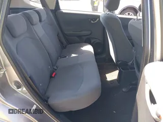 2009 Honda Fit with VIN JHMGE882X9S000639, listed as a IAAI auction lot 42308524 with 211,128 mi miles and . Bid and sale history available at DreamBid. Image 8.