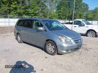 2005 Honda Odyssey EX-L with VIN 5FNRL38765B095027, listed as a IAAI auction lot 42613770 with 221,622 mi miles and . Bid and sale history available at DreamBid. Image 1.