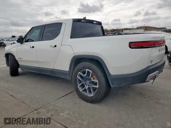 2022 Rivian R1T Adventure z VIN 7FCTGAAA8NN013508, wystawiony jako Copart lot #50834485 z przebiegiem Nie podano mil oraz Szkody całkowita. Historia ofert i sprzedaży dostępna na DreamBid. Obrazek 2.