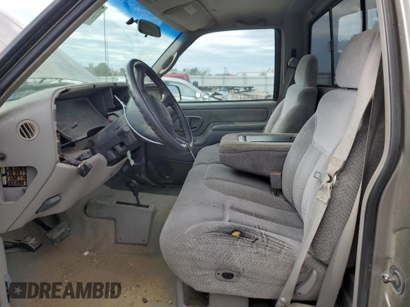 1998 Chevrolet Silverado 1500 with VIN 1GCEK14R9WZ155388, listed as a Copart auction lot 77624754 with 206,464 mi miles and Salvage Title. Bid and sale history available at DreamBid. Image 7.