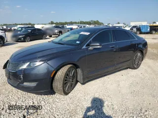 2014 Lincoln MKZ z VIN 3LN6L2JK6ER833317, wystawiony jako Copart lot #50555105 z przebiegiem 157 510 mil mil oraz Szkody całkowita. Historia ofert i sprzedaży dostępna na DreamBid. Obrazek 1.
