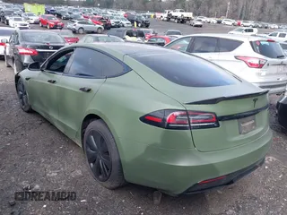 2022 Tesla Model S with VIN 5YJSA1E50NF487306, listed as a IAAI auction lot 41570528 with Not Provided miles and . Bid and sale history available at DreamBid. Image 3.