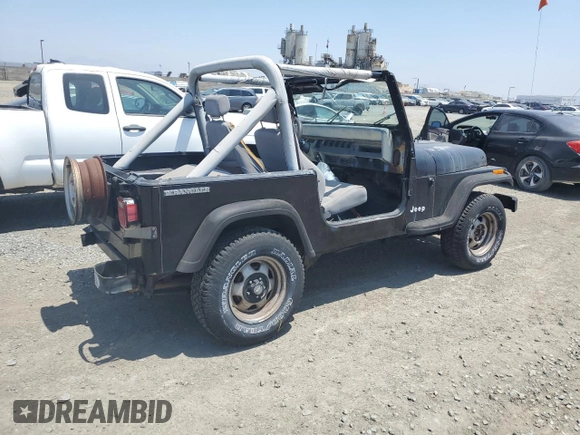 1990 Jeep Wrangler with VIN 2J4FY29T8LJ541585, listed as a Copart auction lot 54352634 with 138,022 mi miles and Salvage Title. Bid and sale history available at carsss.com. Image 3.