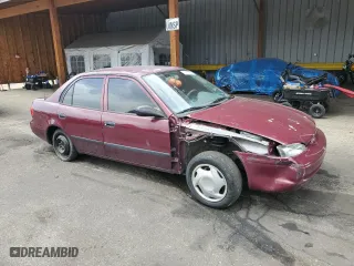 1998 Chevrolet Prizm Lsi with VIN 1Y1SK5287WZ416274, listed as a Copart auction lot 54705335 with 103,304 mi miles and Salvage Title. Bid and sale history available at carsss.com. Image 4.