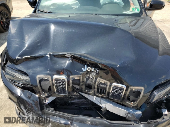 2019 Jeep Cherokee Latitude Plus with VIN 1C4PJMLBXKD233718, listed as a Copart auction lot 58933435 with 56,413 mi miles and Salvage title. Bid and sale history available at DreamBid. Image 12.