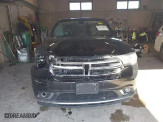 2014 Dodge Durango Limited with VIN 1C4RDJDG1EC973130, listed as a IAAI auction lot 41846596 with 166,182 mi miles. Bid and sale history available at carsss.com. Image 6.