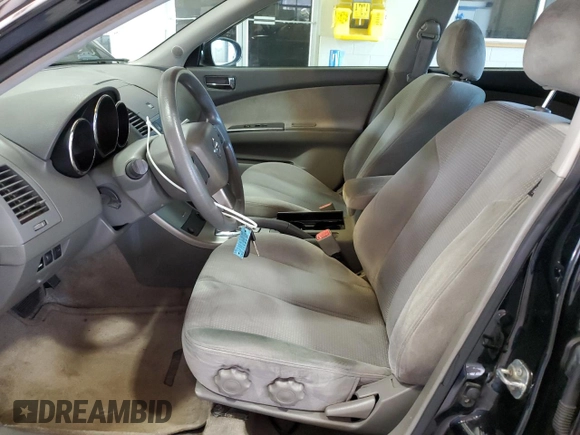 2005 Nissan Altima 2.5 z VIN 1N4AL11E15C100390, wystawiony jako Copart lot #59293435 z przebiegiem 172 157 mil mil oraz Szkoda całkowita • Salvage title. Historia ofert i sprzedaży dostępna na DreamBid. Obrazek 7.