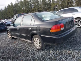 1997 Honda Civic EX with VIN 2HGEJ8542VH520783, listed as a IAAI auction lot 40744085 with 155,772 mi miles. Bid and sale history available at carsss.com. Image 3.