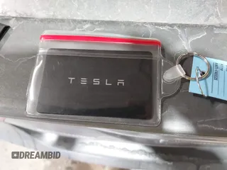2025 Tesla Model 3 Long Range with VIN 5YJ3E1EA4SF913869, listed as a IAAI auction lot 41416608 with 1,141 mi miles and . Bid and sale history available at DreamBid. Image 11.