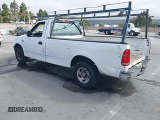 2000 Ford F-150 XL with VIN 1FTZF1724YNB21874, listed as a IAAI auction lot 42489948 with 117,906 mi miles and . Bid and sale history available at DreamBid. Image 3.