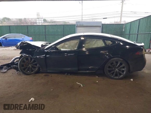 2021 Tesla Model S Long Range Plus with VIN 5YJSA1E28MF425446, listed as a IAAI auction lot 42026147 with 46,464 mi miles and . Bid and sale history available at DreamBid. Image 13.