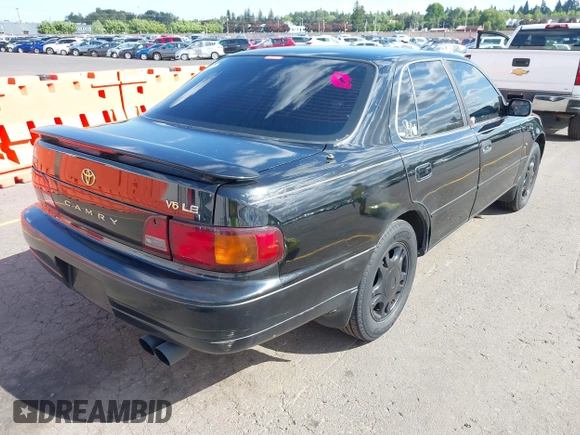 1996 Toyota Camry LE with VIN 4T1BF12K2TU863175, listed as a IAAI auction lot 42020895 with 245,443 mi miles and . Bid and sale history available at DreamBid. Image 4.