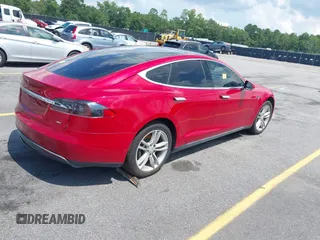 2013 Tesla Model S с VIN 5YJSA1CN9DFP09973, выставлен на аукционе IAAI как лот 42724026 с пробегом 61 546 миль миль и . История ставок и продаж доступна на DreamBid. Изображение 4.