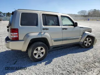 2010 Jeep Liberty Sport with VIN 1J4PP2GK9AW128825, listed as a Copart auction lot 48113835 with 258,730 mi miles and Salvage Title. Bid and sale history available at DreamBid. Image 3.