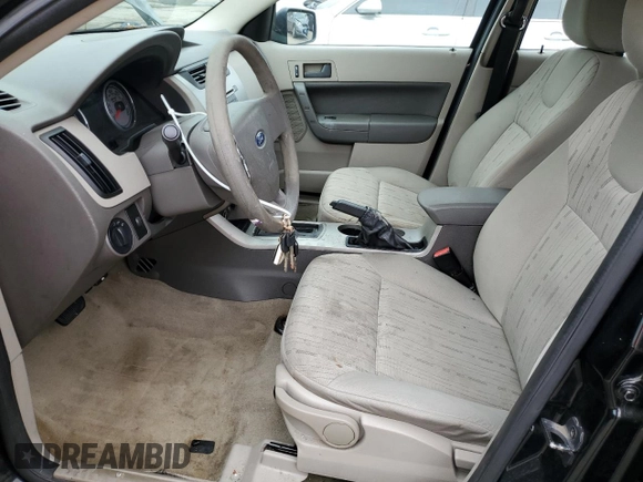 2009 Ford Focus SE z VIN 1FAHP35N69W138629, wystawiony jako Copart lot #58012605 z przebiegiem 155 557 mil mil oraz Szkoda całkowita • Salvage title. Historia ofert i sprzedaży dostępna na DreamBid. Obrazek 7.