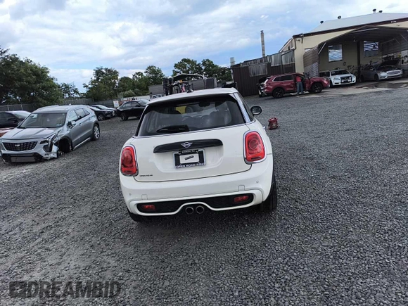 2021 MINI Hardtop 4 Door Cooper S with VIN WMWXU9C09M2P43346, listed as a Copart auction lot 68969854 with 22,394 mi miles and Salvage title. Bid and sale history available at DreamBid. Image 6.