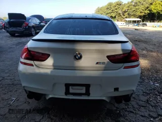 2016 BMW M6 z VIN WBS6E9C51GG437202, wystawiony jako Copart lot #71389434 z przebiegiem 80 673 mil mil oraz Szkoda całkowita • Salvage title. Historia ofert i sprzedaży dostępna na DreamBid. Obrazek 6.