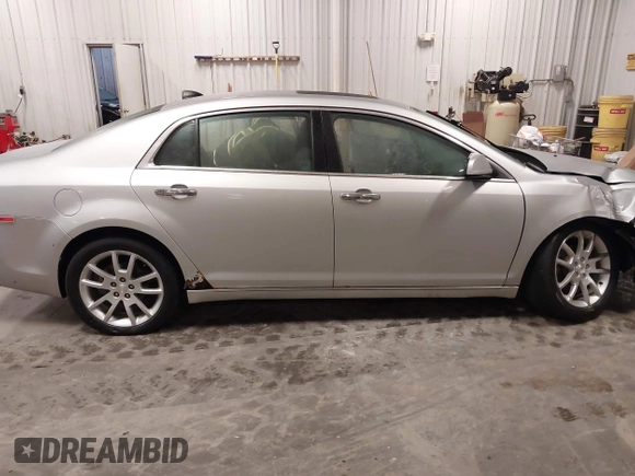 2012 Chevrolet Malibu LTZ with VIN 1G1ZG5E77CF375464, listed as a IAAI auction lot 41509140 with 197,329 mi miles and . Bid and sale history available at DreamBid. Image 13.