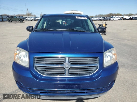 2009 Dodge Caliber SXT with VIN 1B3HB48A99D157051, listed as a Copart auction lot 52098965 with 188,268 mi miles and Salvage Title. Bid and sale history available at carsss.com. Image 5.