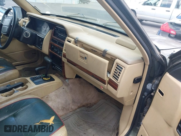 1995 Jeep Grand Cherokee Limited с VIN 1J4GZ78Y2SC558015, выставлен на аукционе IAAI как лот 42513097 с пробегом 218 392 миль миль и . История ставок и продаж доступна на DreamBid. Изображение 5.