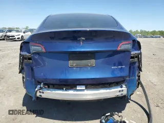 2022 Tesla Model Y Long Range z VIN 7SAYGDEEXNF444122, wystawiony jako Copart lot #54344735 z przebiegiem 33 230 mil mil oraz Szkody całkowita. Historia ofert i sprzedaży dostępna na DreamBid. Obrazek 6.
