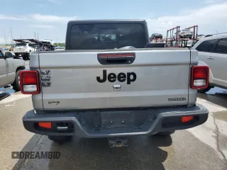 2020 Jeep Gladiator Sport S with VIN 1C6JJTAG9LL149872, listed as a Copart auction lot 58518095 with 118,910 mi miles and Salvage title. Bid and sale history available at DreamBid. Image 6.