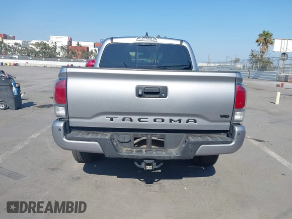 2021 Toyota Tacoma SR with VIN 5TFCZ5AN6MX270972, listed as a IAAI auction lot 42460823 with 76,062 mi miles and . Bid and sale history available at DreamBid. Image 17.