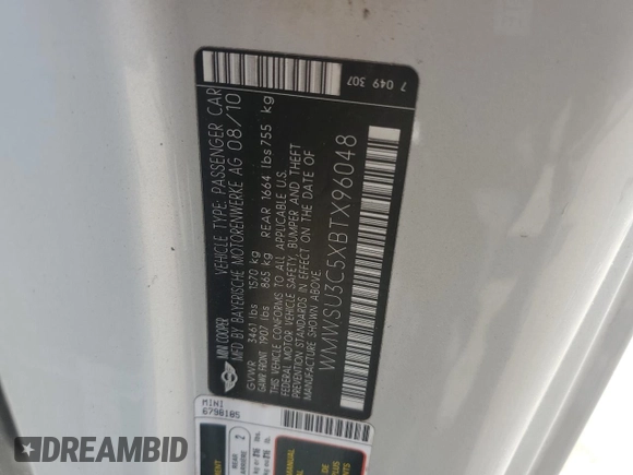 2011 MINI Hardtop with VIN WMWSU3C5XBTX96048, listed as a Copart auction lot 57607955 with 99,632 mi miles and Salvage title. Bid and sale history available at DreamBid. Image 12.