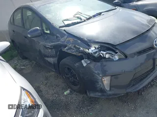 2015 Toyota Prius Four z VIN JTDKN3DU7F2003225, wystawiony jako IAAI lot #41741030 z przebiegiem 195 090 mil mil oraz . Historia ofert i sprzedaży dostępna na DreamBid. Obrazek 1.
