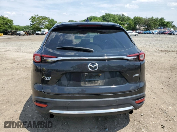 2018 Mazda CX-9 Grand Touring with VIN JM3TCBDY4J0232657, listed as a Copart auction lot 60405055 with 131,924 mi miles and Salvage title. Bid and sale history available at DreamBid. Image 6.