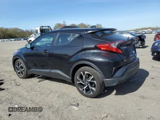 2021 Toyota C-HR LE z VIN NMTKHMBX2MR133802, wystawiony jako Copart lot #54398745 z przebiegiem 152 133 mil mil oraz Szkoda całkowita • Salvage title. Historia ofert i sprzedaży dostępna na DreamBid. Obrazek 2.