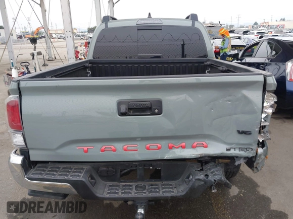 2023 Toyota Tacoma SR z VIN 3TMCZ5AN1PM602567, wystawiony jako IAAI lot #42355648 z przebiegiem 32 472 mil mil oraz . Historia ofert i sprzedaży dostępna na DreamBid. Obrazek 16.