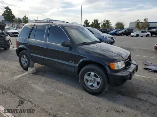 2002 Kia Sportage with VIN KNDJA723325155200, listed as a Copart auction lot 66326204 with 85,381 mi miles and Salvage Title. Bid and sale history available at carsss.com. Image 4.