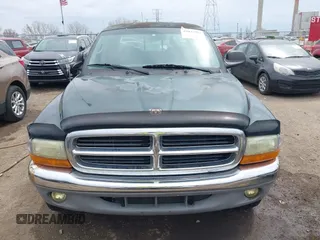 2001 Dodge Dakota Sport z VIN 1B7HG2ANX1S256902, wystawiony jako IAAI lot #42037703 z przebiegiem 121 914 mil mil oraz . Historia ofert i sprzedaży dostępna na DreamBid. Obrazek 12.