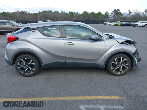 2019 Toyota C-HR XLE with VIN NMTKHMBX7KR078292, listed as a IAAI auction lot 41705966 with 104,352 mi miles. Bid and sale history available at carsss.com. Image 14.