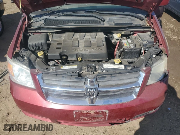 2010 Dodge Grand Caravan Crew with VIN 2D4RN6DX0AR438059, listed as a Copart auction lot 46850575 with 137,665 mi miles and Salvage Title. Bid and sale history available at DreamBid. Image 12.