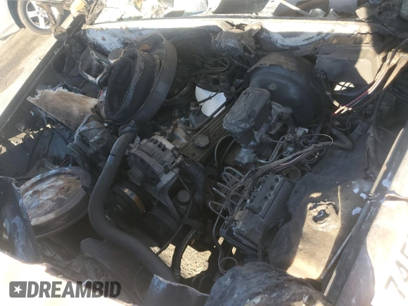 1994 GMC Suburban z VIN 1GKEC16K3RJ769051, wystawiony jako Copart lot #74576864 z przebiegiem Nie podano mil oraz Nie do naprawy • Non repairable. Historia ofert i sprzedaży dostępna na DreamBid. Obrazek 11.